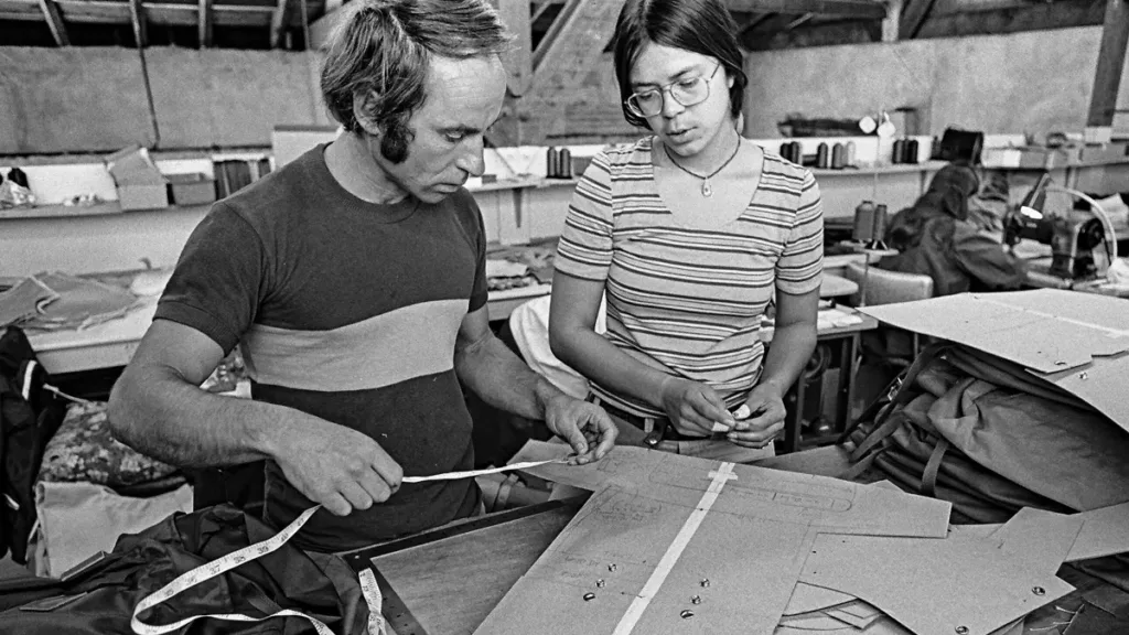 Patagonia founder Yvon Chouinard and then-seamstress Val Franco reimagine a backpack in 1974. 